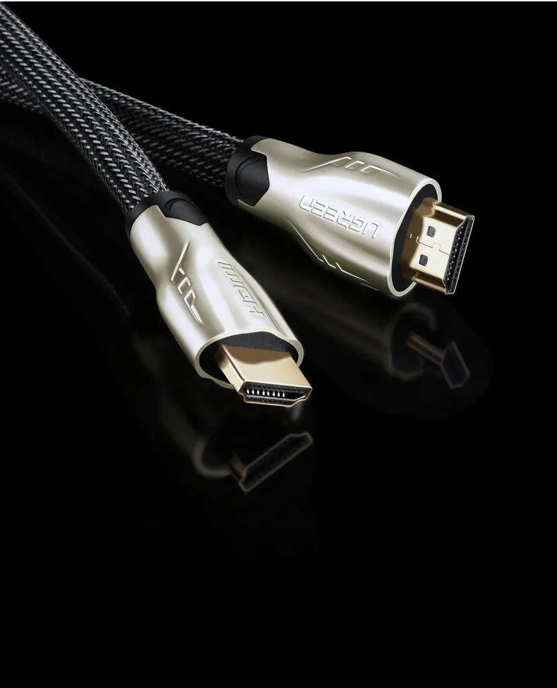 Version 2.0 4K HDMI cable with gold-plated connectors and black PVC jacket showing triple-layer shielding construction