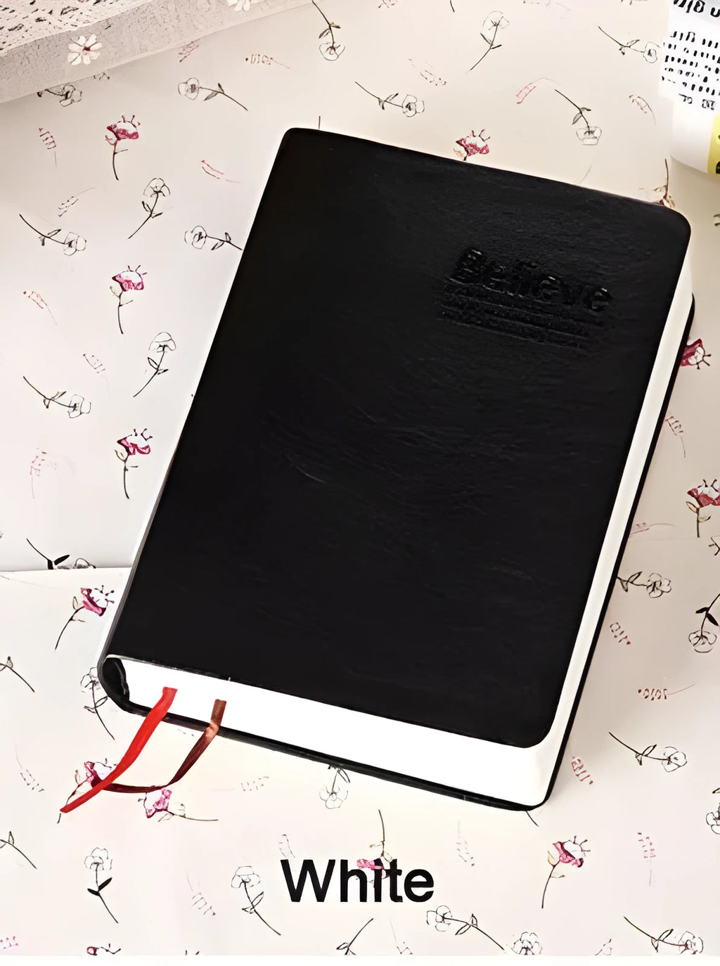 Large thick leather notebook 17 x 12 cm with 480 pages and gold or white cover.