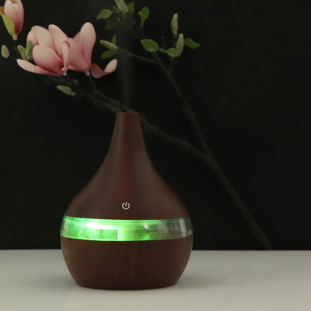 Columnar USB mini air humidifier in light wood grain finish with remote control