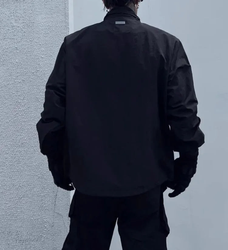 Black polyester shell jacket with double zipper and stand collar, sizes M L XL