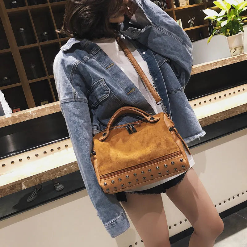 Soft PU women's tote shoulder bag showing smooth zipper and high-quality hardware in black colour option