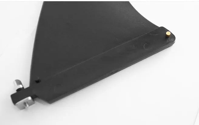 SUP paddle with detachable fish fins showing screw attachment mechanism and plastic construction