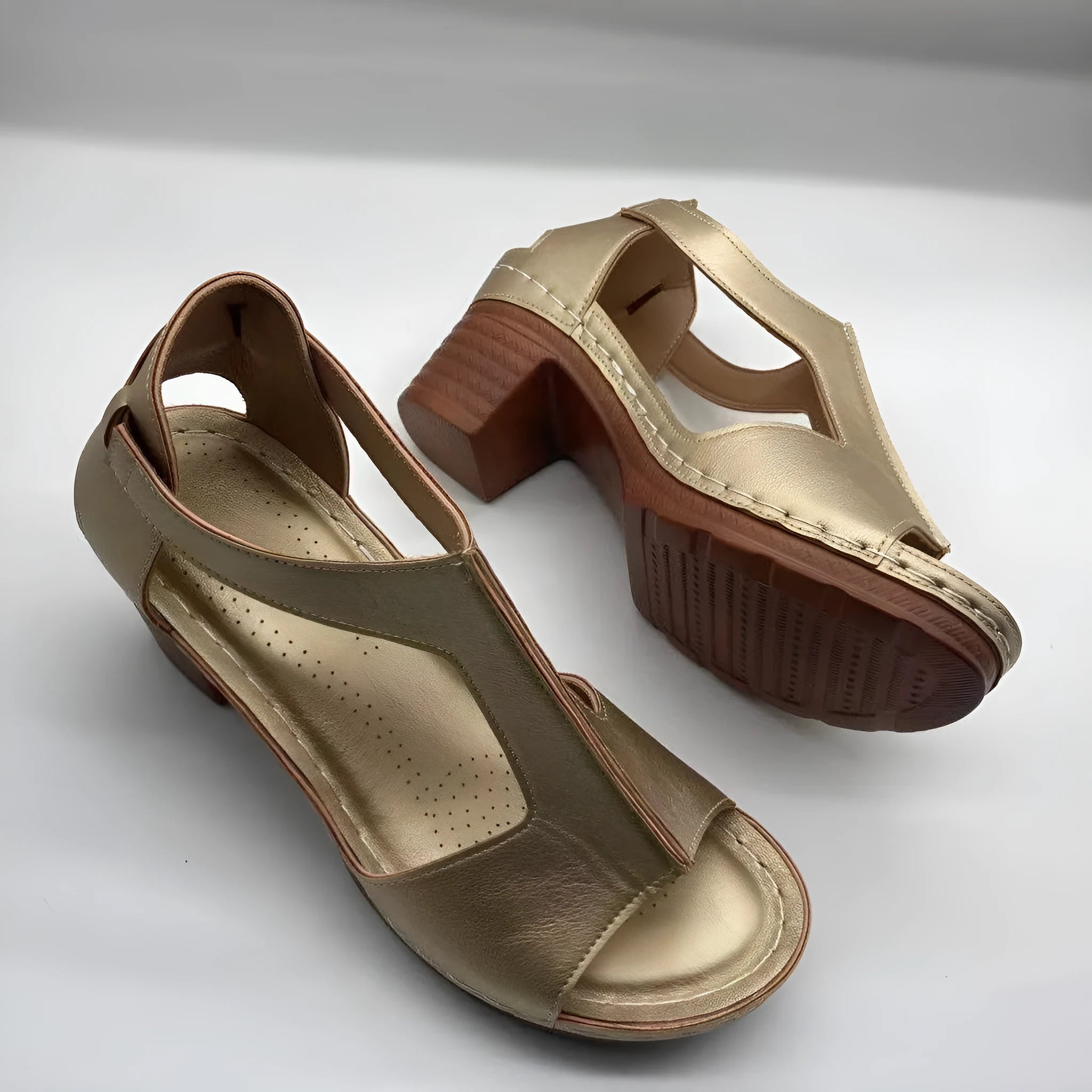 Women's plus size peep toe wedge sandals with a buckle strap in a light brown colour.