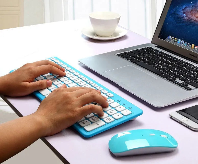 Wireless keyboard and mouse set in black showing crater structure keys and three-speed DPI mouse with USB receiver