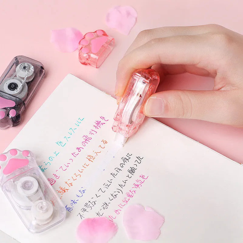 Cat claw and paw print design correction tape dispenser with 5mm width and 6 metre length.