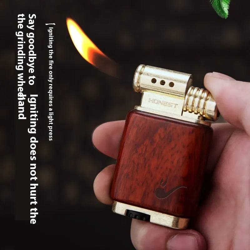 Ebony gas lighter with black wood body and rosewood decorative accents including sun surface and good luck designs