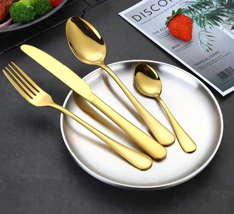 24-piece stainless steel cutlery set showing knives, forks, tablespoons and teaspoons in multiple finish colours