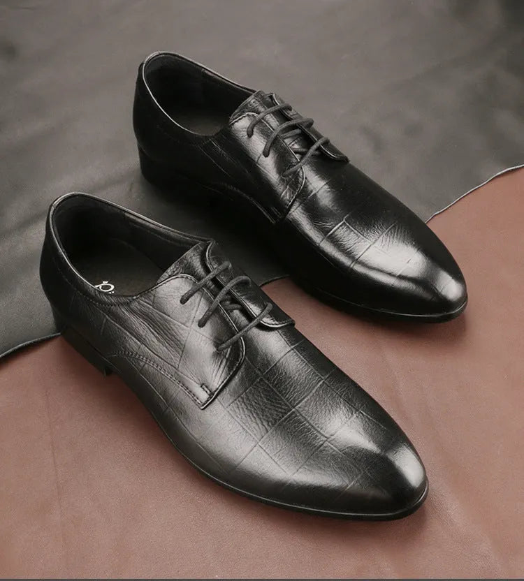 Men's black leather Derby shoes with pointed toe, handmade sewing details, and antiskid rubber sole