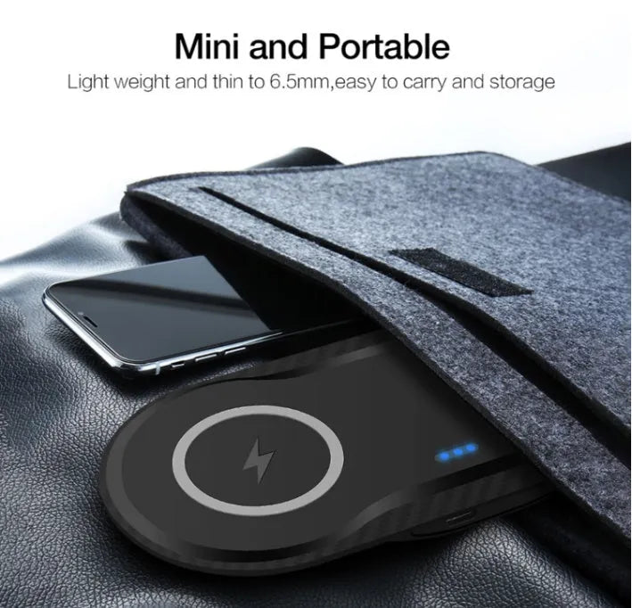 Black and white dual 10W wireless charger charging two phones simultaneously on silicone anti-slip base