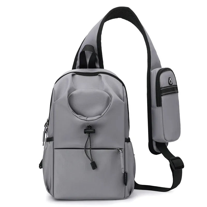 Dark grey Oxford cloth crossbody chest bag with stitching detail, shown being worn.