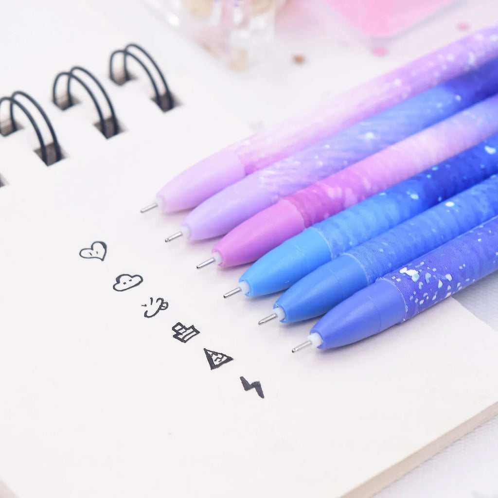 Box containing 12 constellation-themed plastic gel pens with quick-drying ink