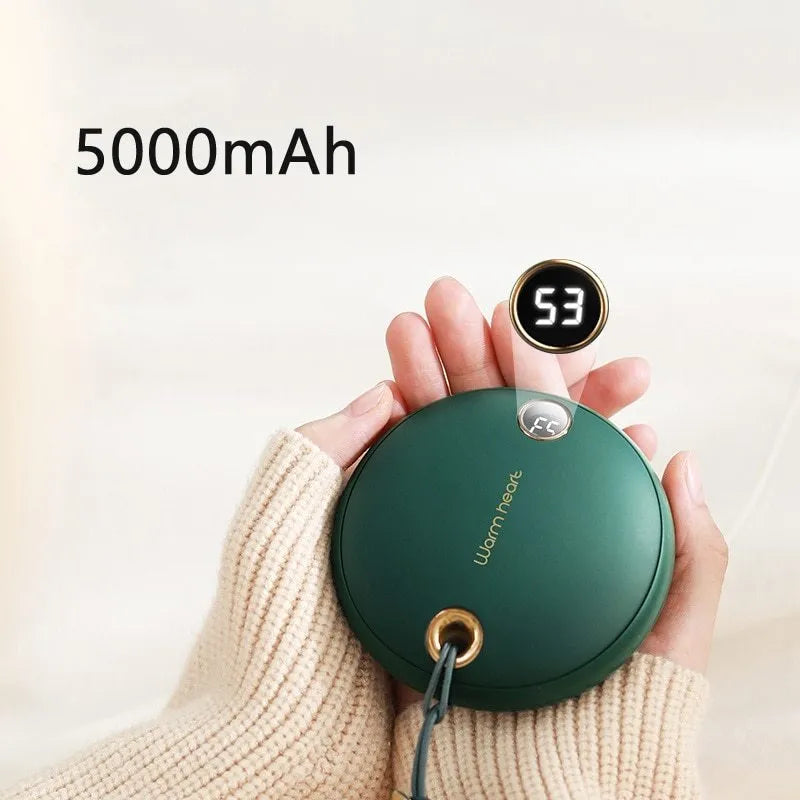 Green hand warmer power bank showing digital display with 5000mAh capacity and Type-C port