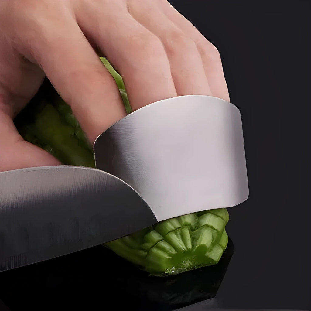Stainless steel finger guard for kitchen safety shown in single and double finger sizes on a cutting board.