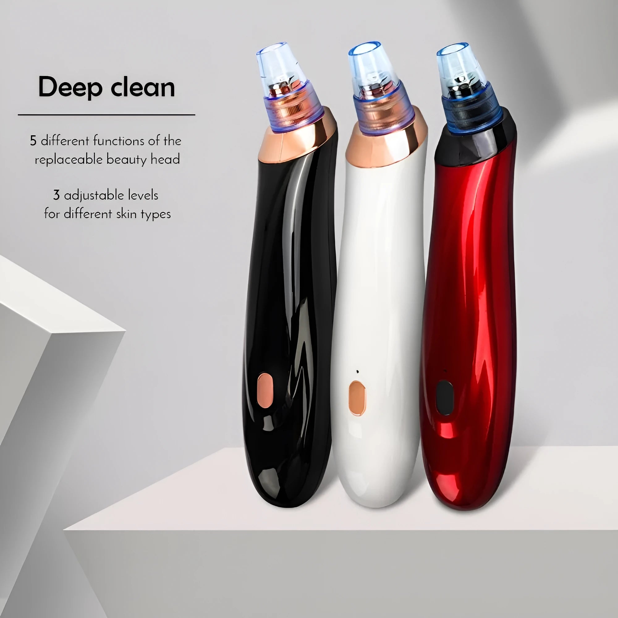 Handheld electric blackhead remover tool with multiple nozzle attachments on a white background.