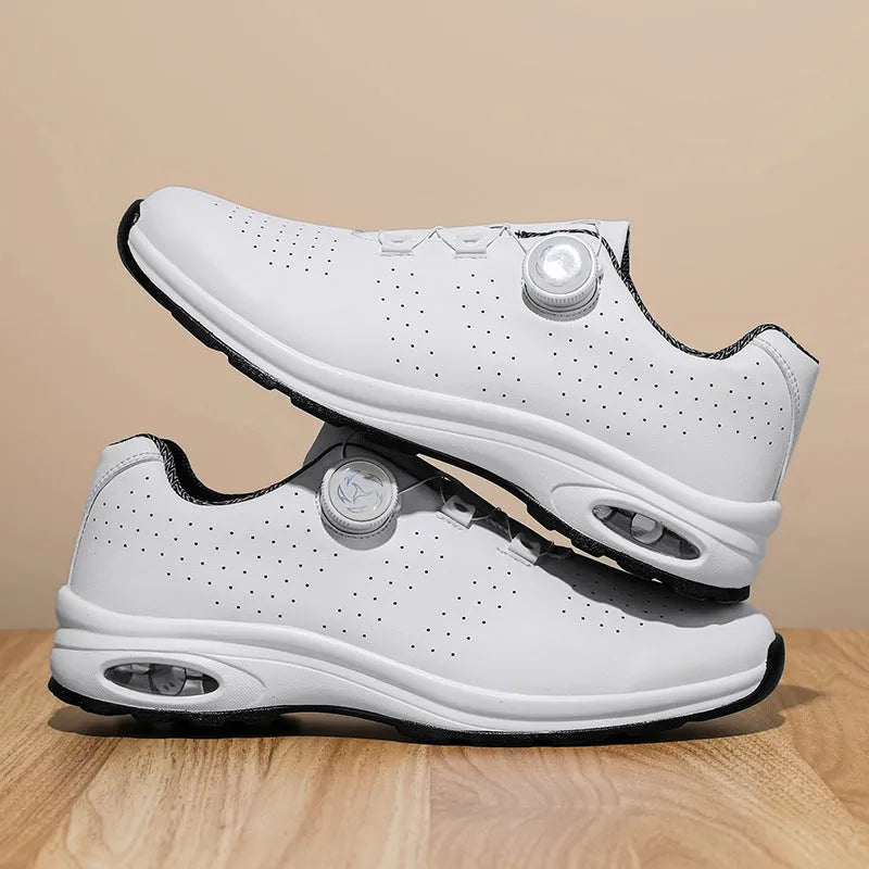 Low-top casual shoes in black with mesh upper, composite sole, and lace-up front closure on a neutral background