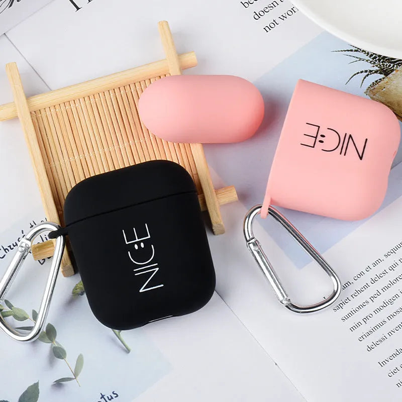 Wireless headset cover for Apple AirPods in black and pink colours with various style designs