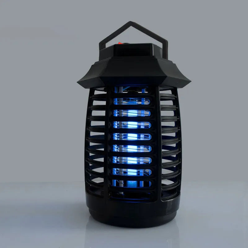 Black aromatherapy mosquito lamp with glass UV tube for mosquito trapping in indoor settings