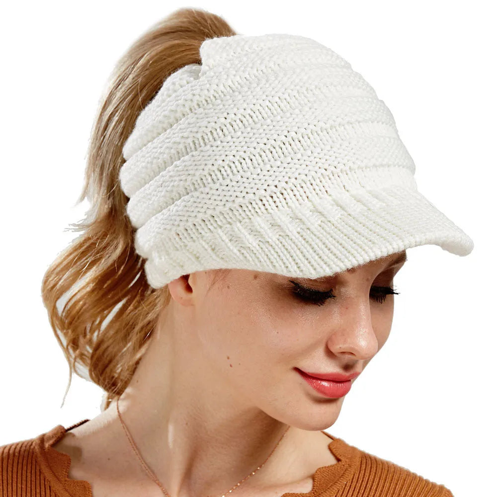 Women's soft acrylic knit ponytail beanie hat in assorted colours on a white background