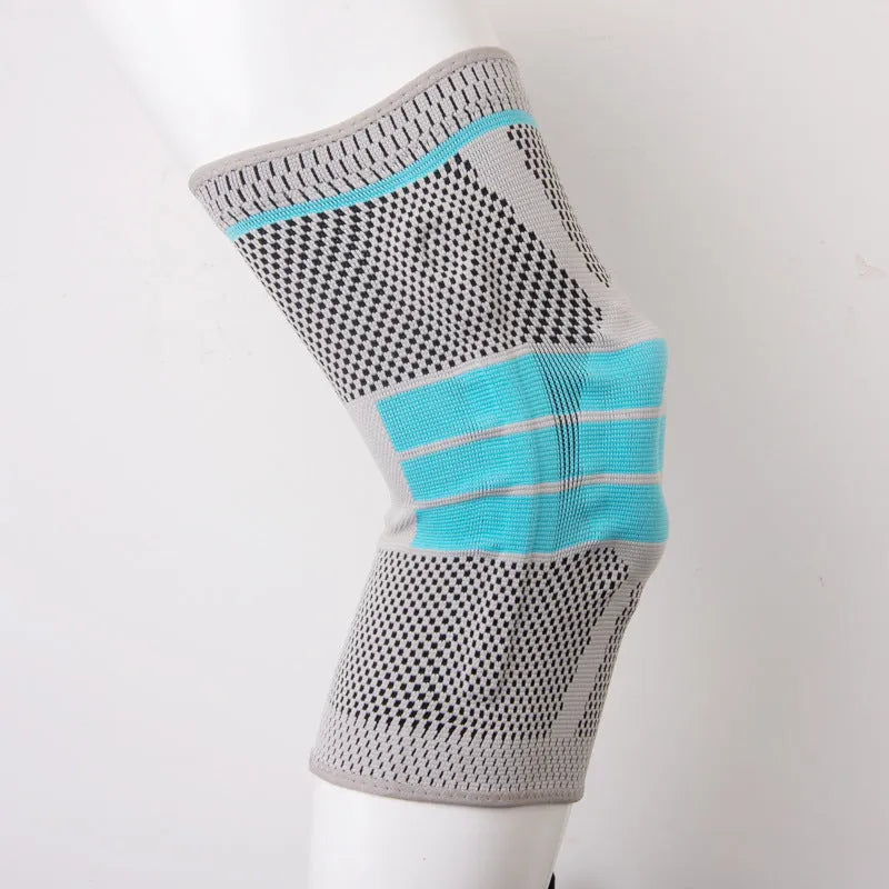 Sky blue silicone grip knee pads for sports, shown in sizes S, M, L, and XL.