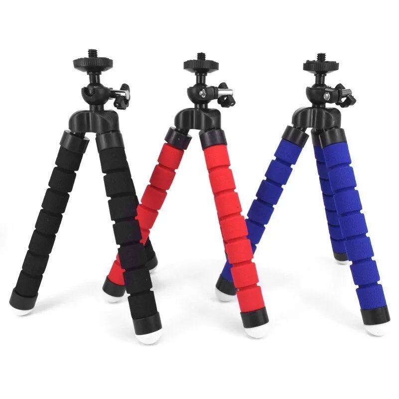 Black mini flexible octopus tripod stand wrapped around a pole holding a smartphone for video recording