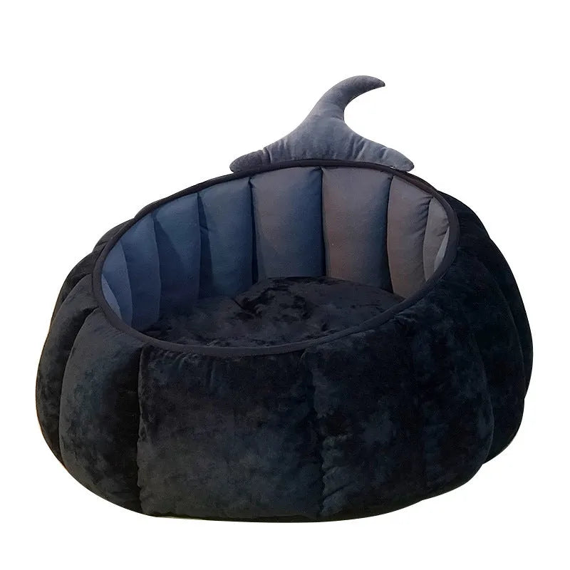 Halloween-themed cat bed with cartoon devil pumpkin design in soft plush material for small pets