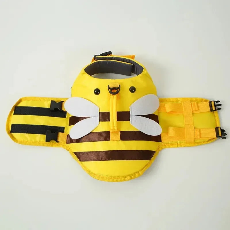 Green dog life vest with reflective strips and a D-ring handle on the back, shown fitted on a dog.