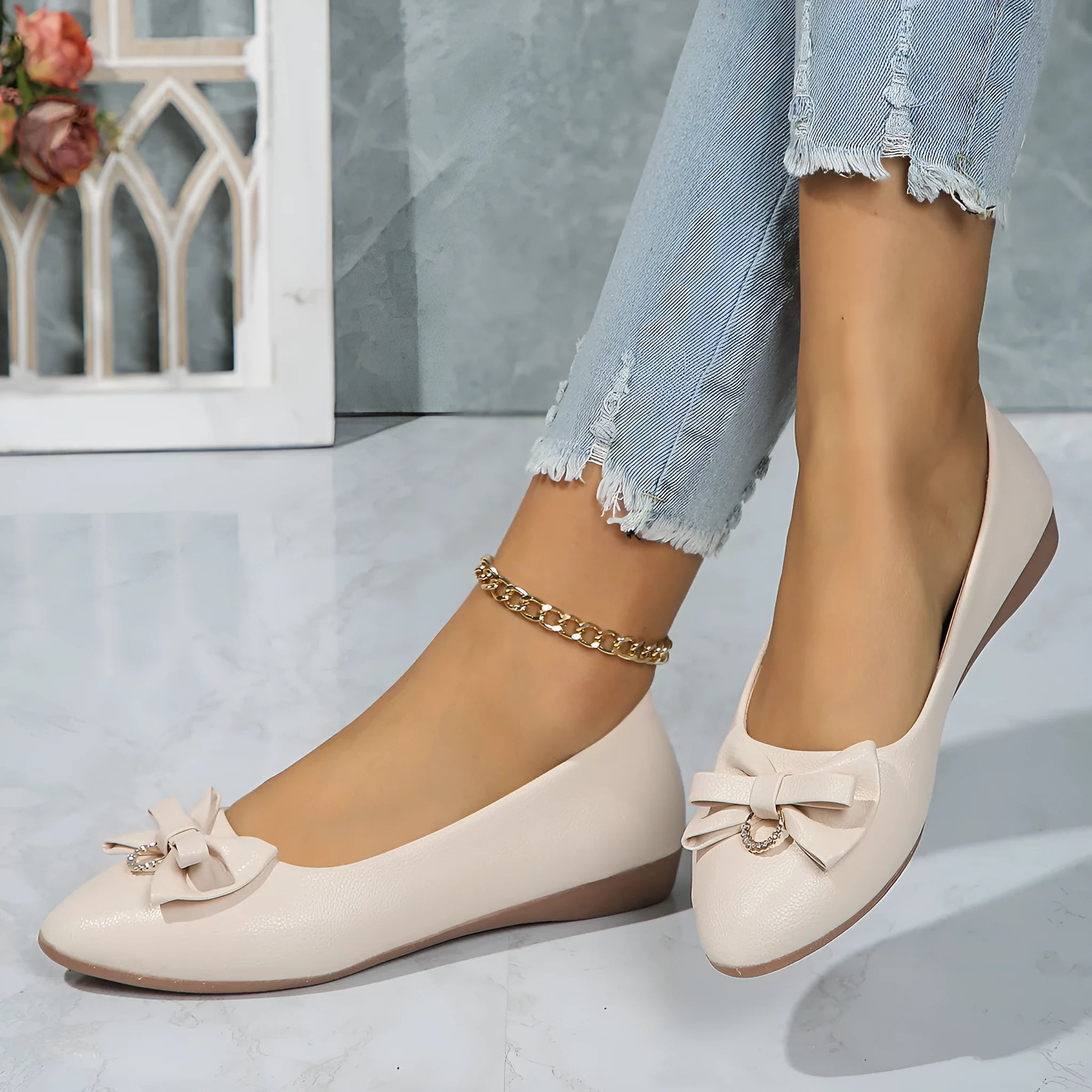 Women's flat casual shoes with bowknot detail and shallow mouth opening in beige colour
