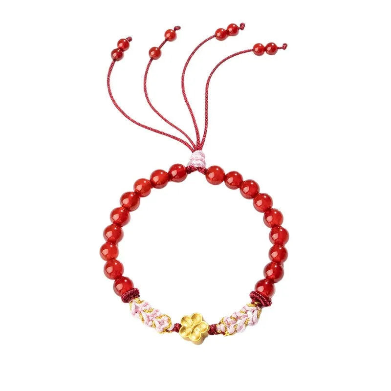 Chinese style hand-woven red rope bracelet with diamond crystal and peach blossom design in pink or red agate.