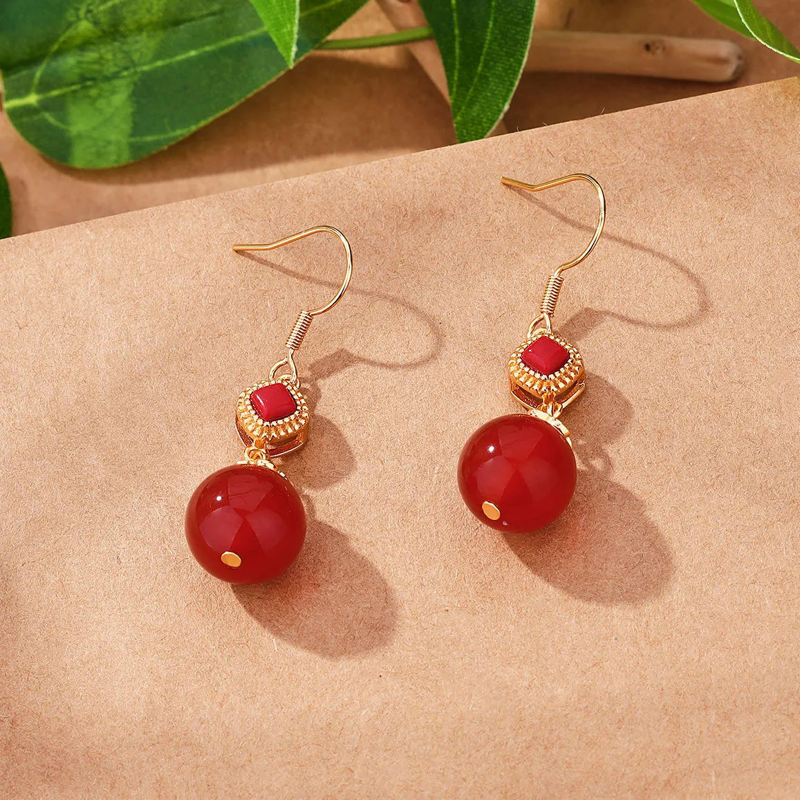 Southern red agate round bead earrings with geometric design and S925 silver inlaid jasper accents