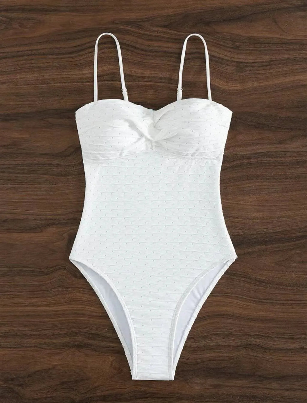 White women's one-piece swimsuit with sling style design