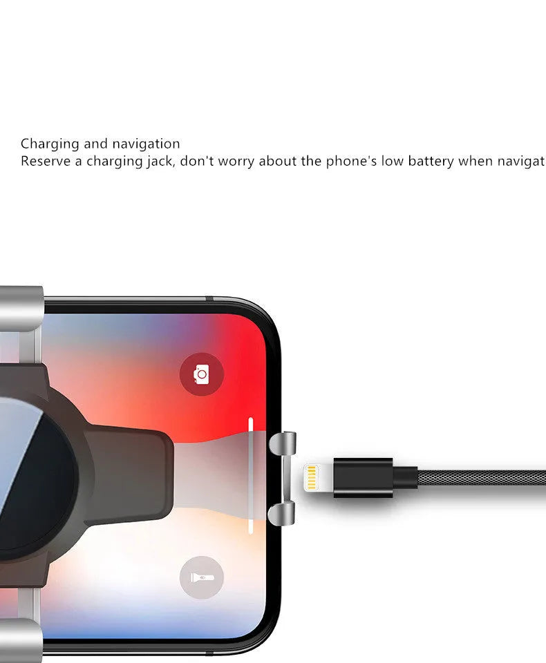 S4 gravity mirror ABS mobile phone bracket attached to car air conditioning vent, holding a smartphone