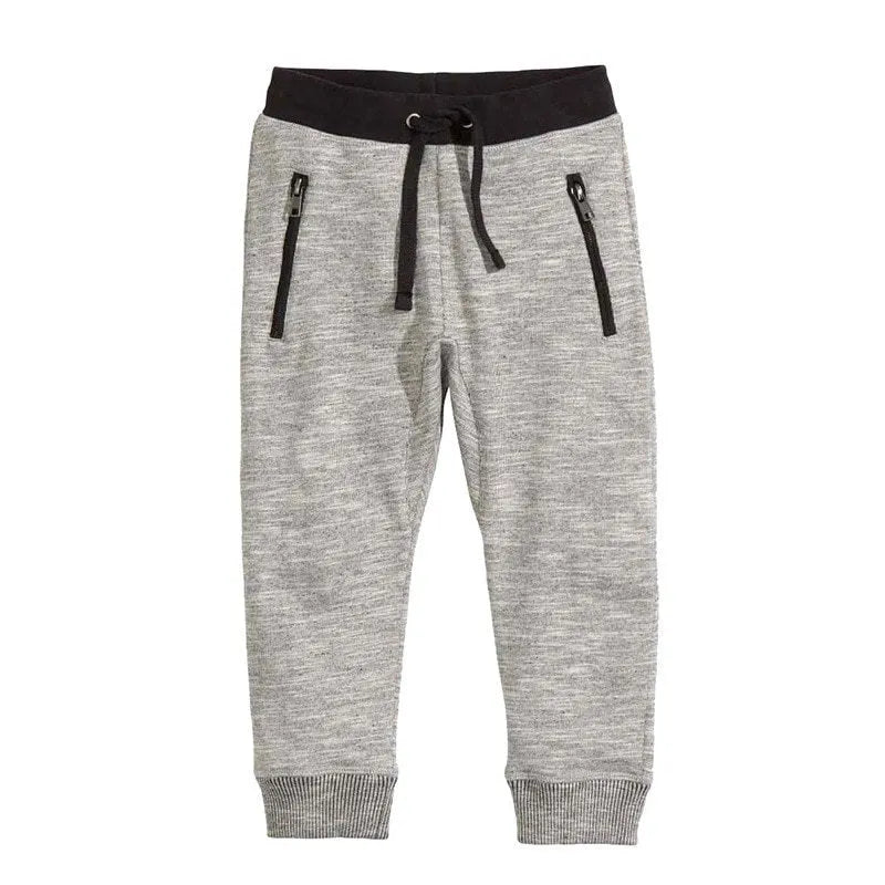 A boys' casual cotton two-piece clothing set with a long-sleeved letter-print t-shirt and matching pants.