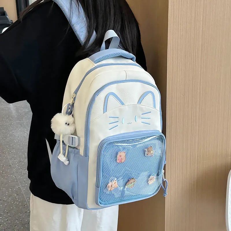 Cartoon design nylon backpack with curved shoulder straps shown in pink colour