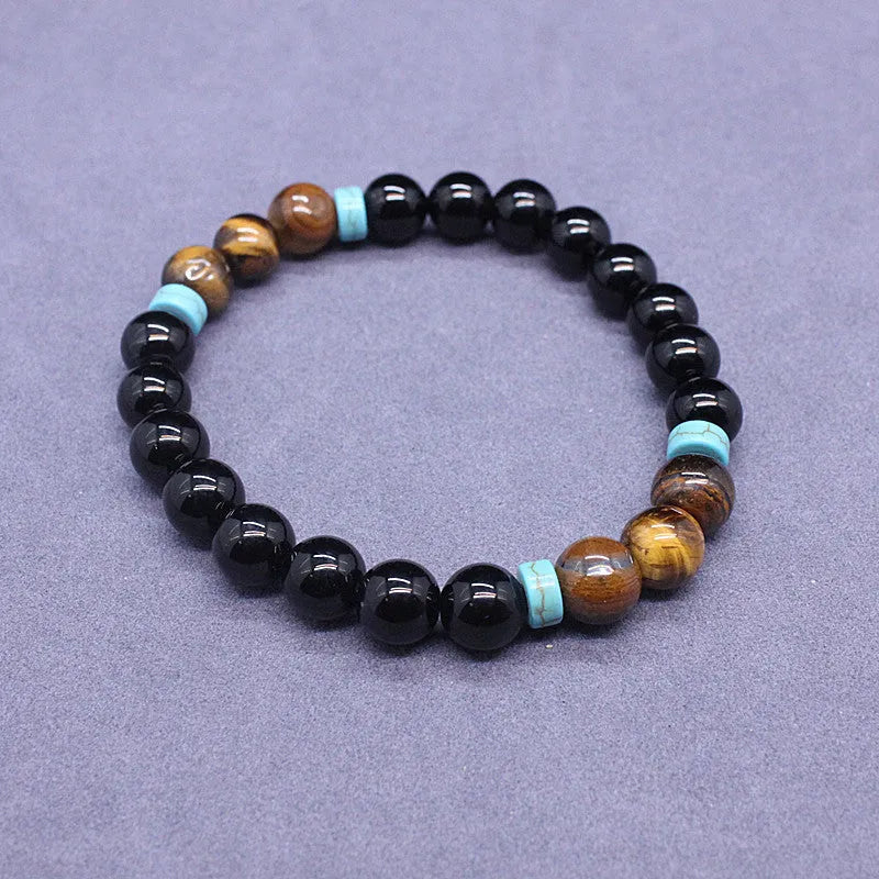 Black agate bracelet and matching necklace with tiger-shaped Tiger's Eye stones in geometric European-American design
