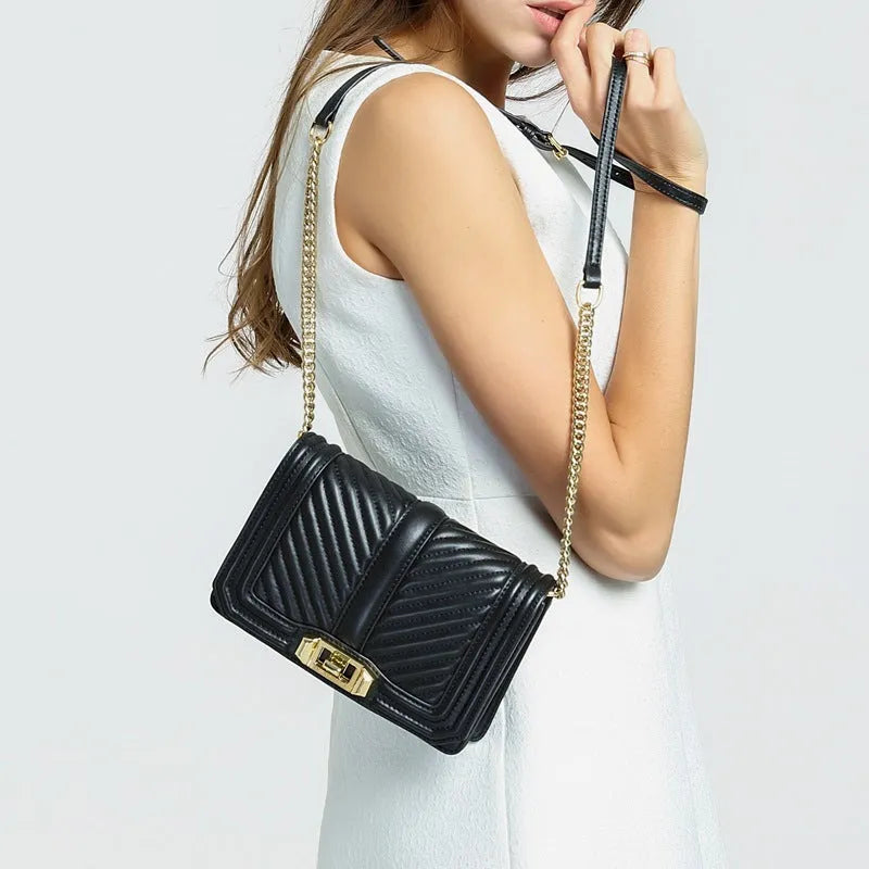 Women's rhombic chain shoulder bag in first layer cowhide with plaid pattern, cover type opening and cotton lining