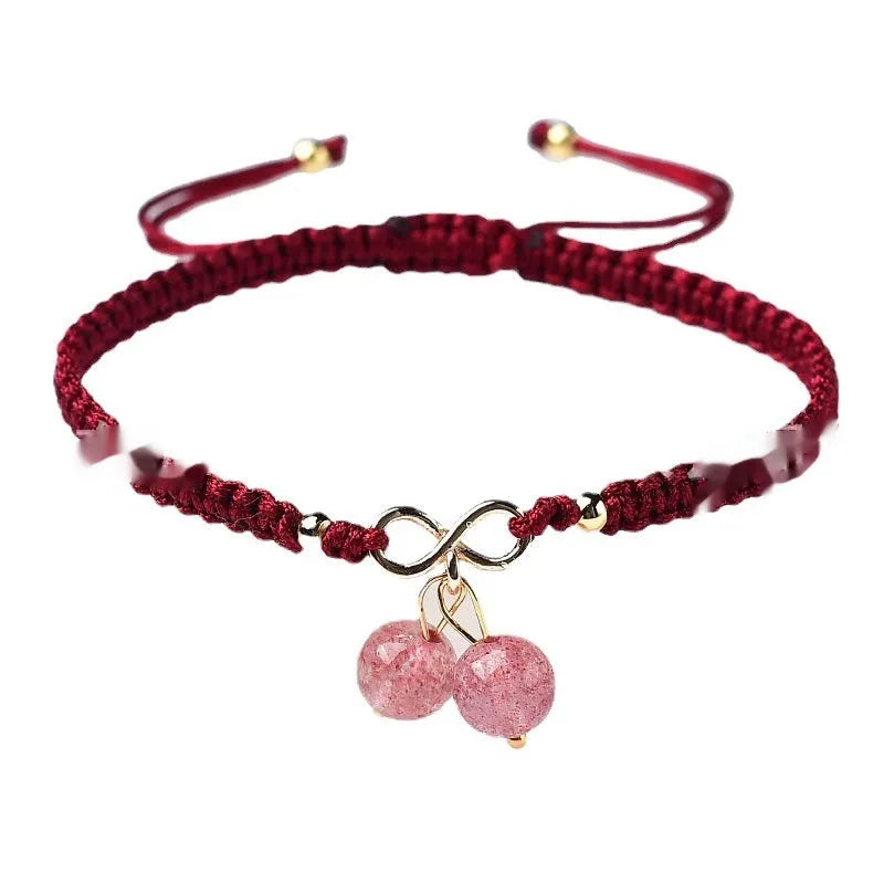 Adjustable strawberry quartz cherry bracelet with 8mm beads on wrist showing natural inclusions