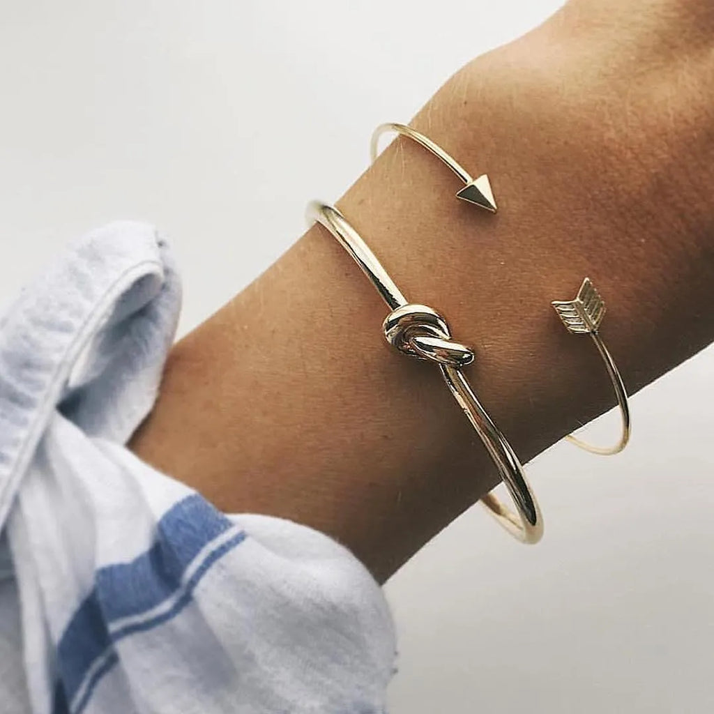 Women's vintage cuff arrow knotted bracelet with 2.5cm width and electroplated gold finish