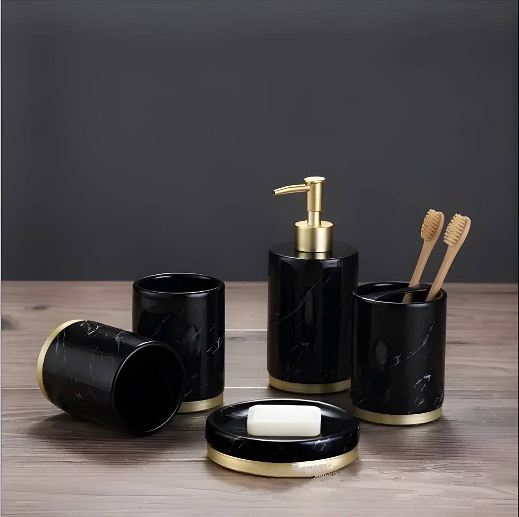 Ceramic bathroom set showing bright glaze emulsion bottle, cup, toothbrush holder, and soap dish with applique detailing.