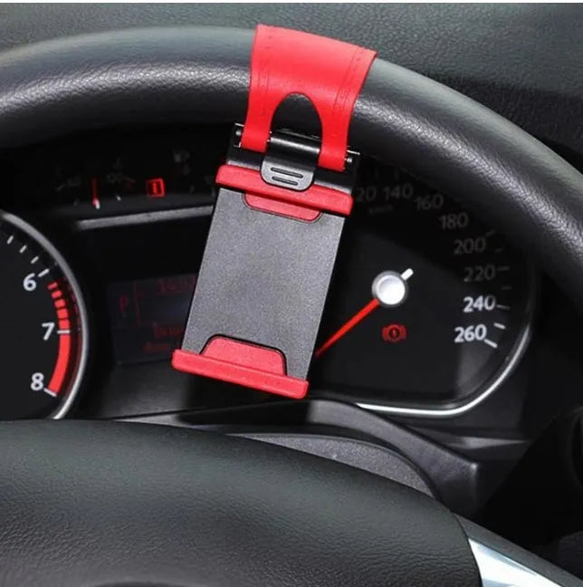 Black steering wheel phone holder mounted showing phone compatibility with dimensions 75x40x25mm