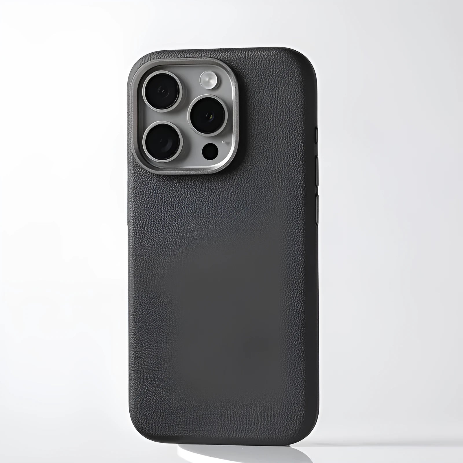 Leather MagSafe compatible iPhone case with metal alloy lens surround in black, brown, and grey colour options