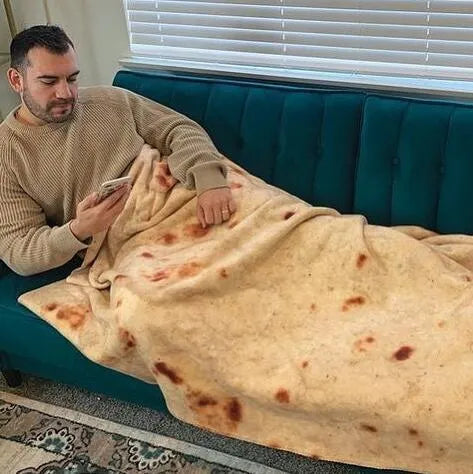 Flannel burrito blanket with food-themed print, showing soft microfiber fleece texture and round or rectangular shape options