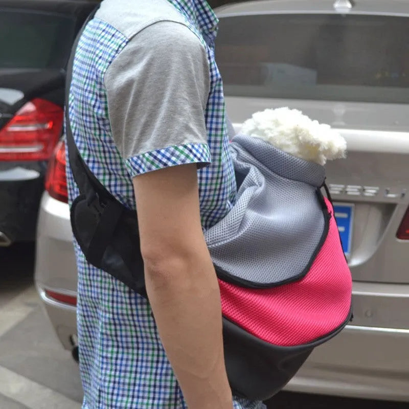 Pet backpack in selected colour with adjustable shoulder straps and foam-padded interior for small dog transport