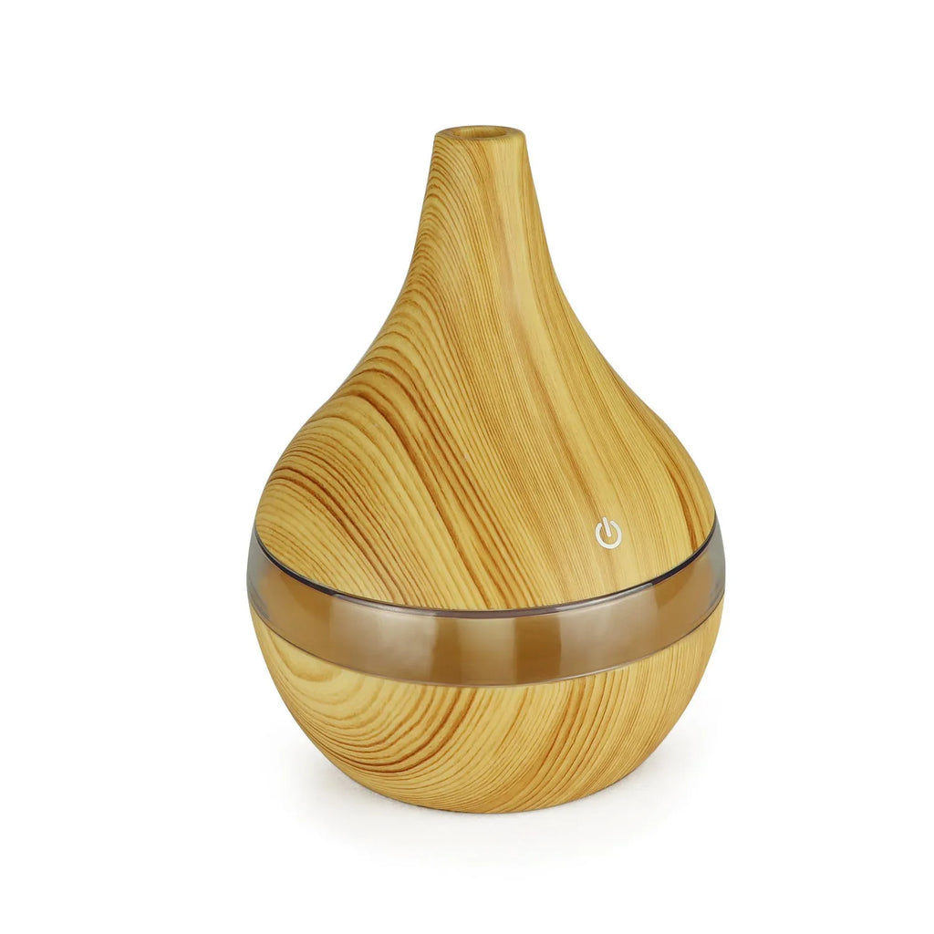 Columnar USB mini air humidifier in light wood grain finish with remote control
