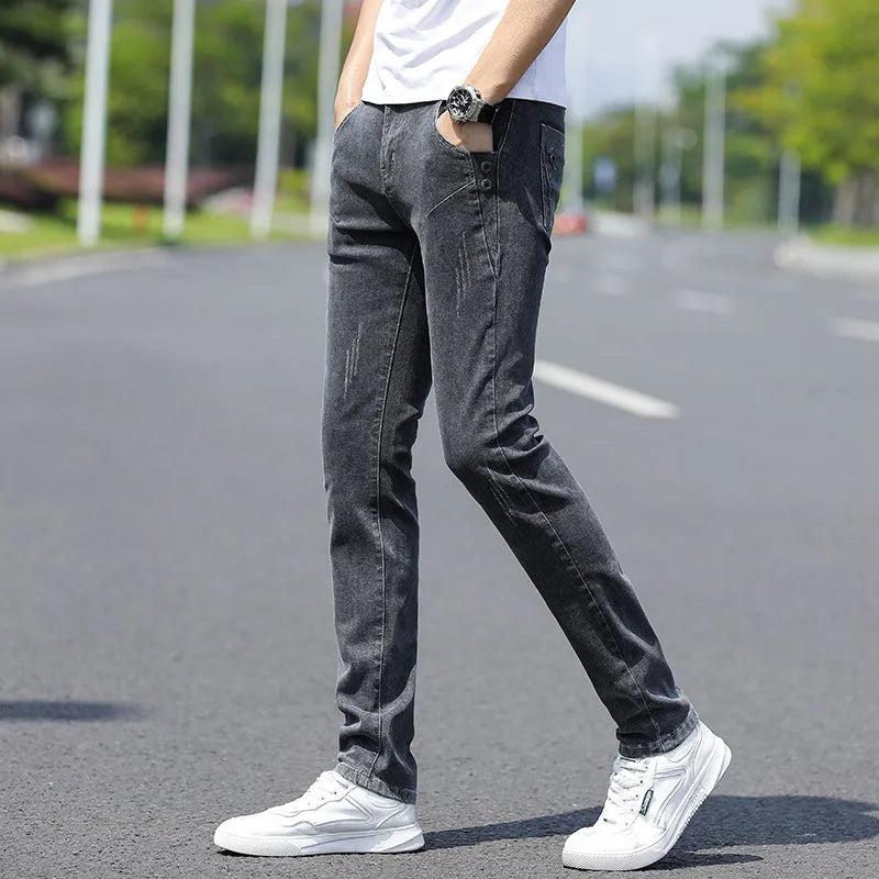 Men's stretch slim fit skinny tapered pants with mid waist and zip fly in blue, grey, or black