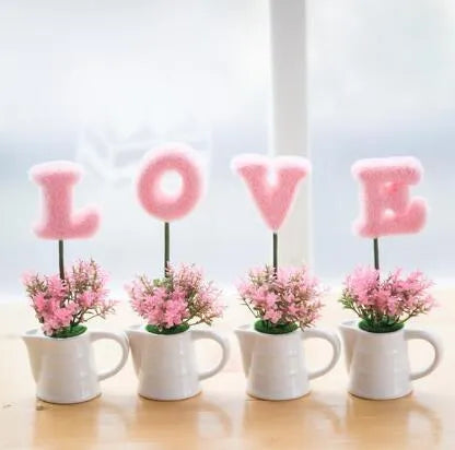 Ceramic hanging plant decoration in pastoral style, available in green, pink, purple, and red for home furnishing.