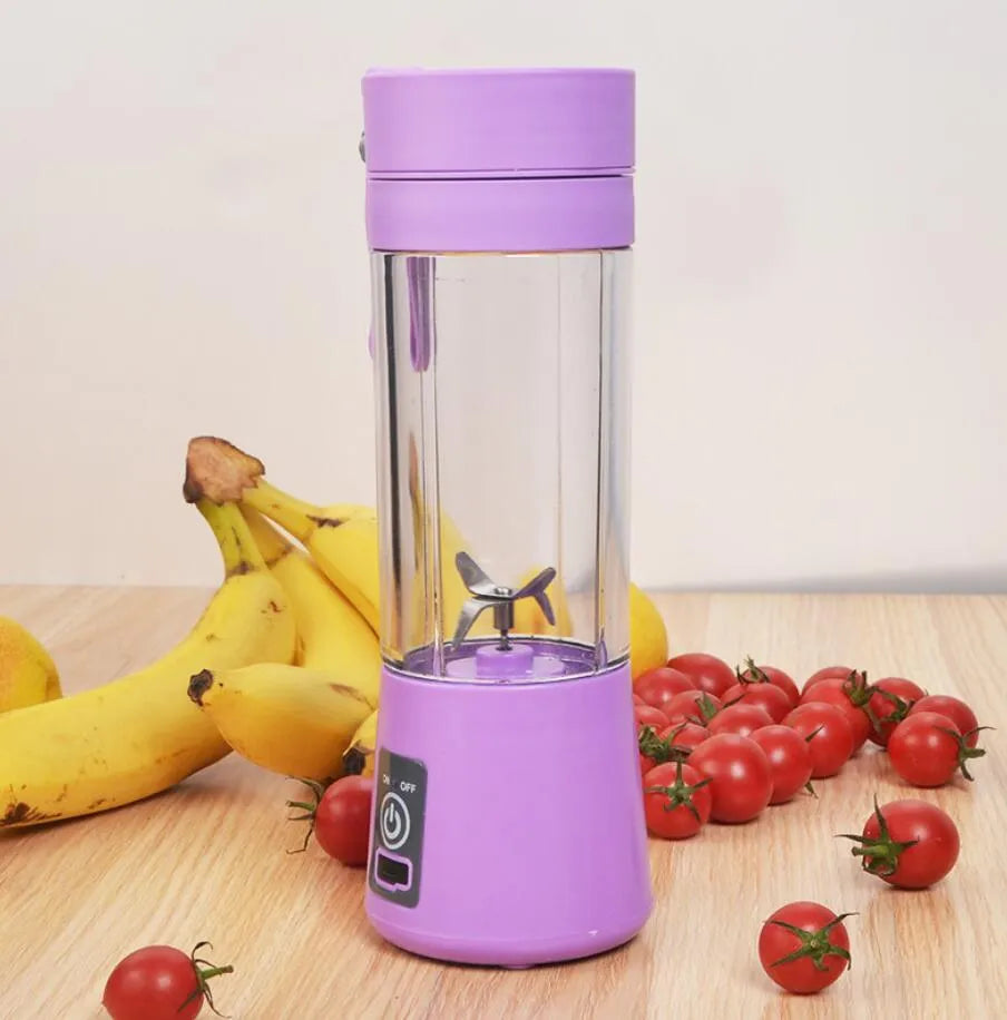 Mini USB electric fruit juicer in pink with stainless steel blade and carry rope