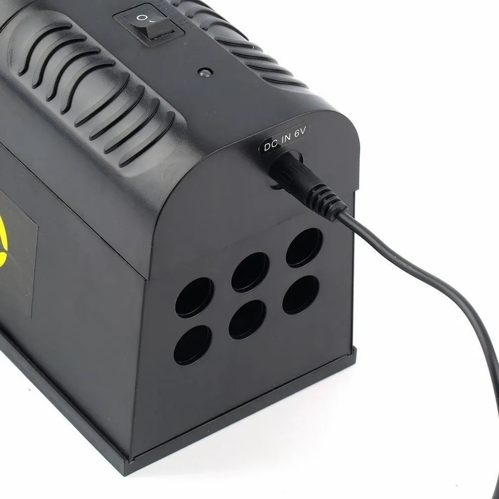 Black high voltage electronic rodent killer device with choice of UK, EU, or US plug.