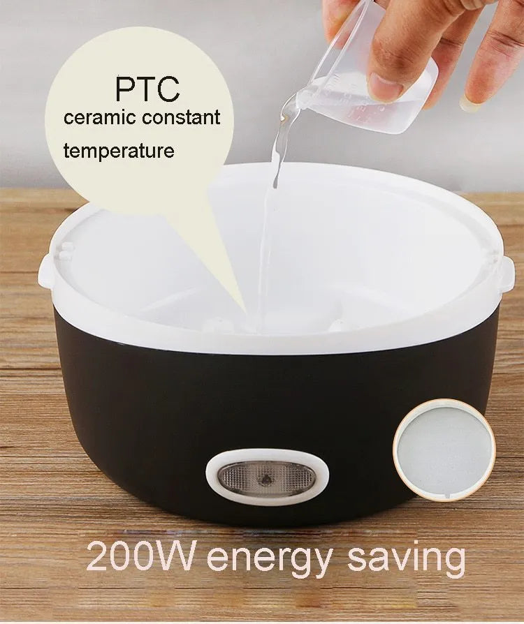 White plastic lunch box with multiple layers showing USB power port and heating function indicator