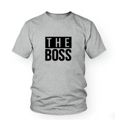 A loose-fit men's round neck t-shirt with a short sleeve and printed design, laid flat.
