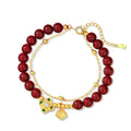 Women's geometric sterling silver bracelet with Ruyi, Xiangyun and red cinnabar flower detailing.